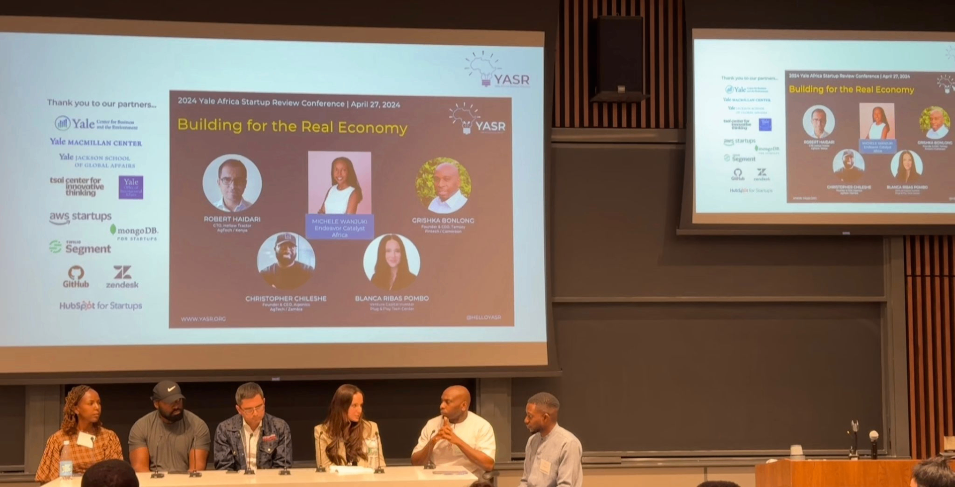 Nomadic Minds team speaking on a startup panel event